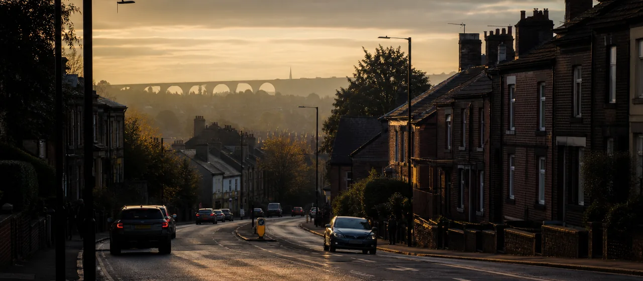 Stockport-style town road with brick neighbourhoods and changing elevation